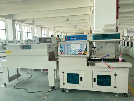 Automatic milk tea cup heat shrinking wrapping machine.jpg